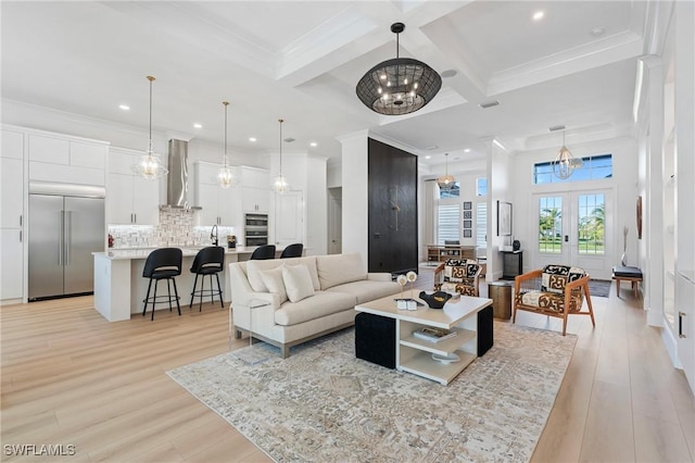 living room with french doors, coffered ceiling, ornamental molding, beamed ceiling, and light hardwood / wood-style floors