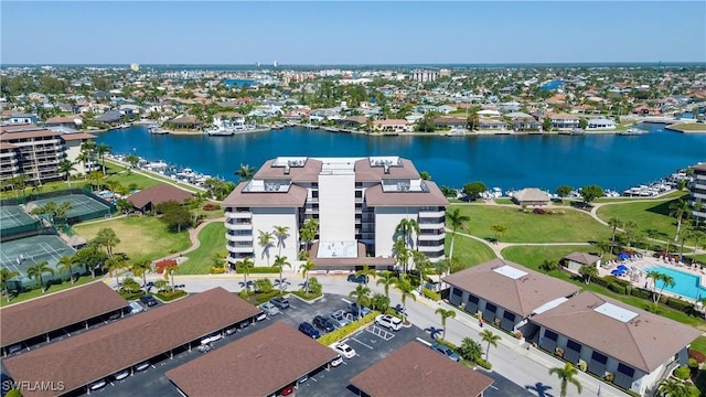 drone / aerial view with a water view