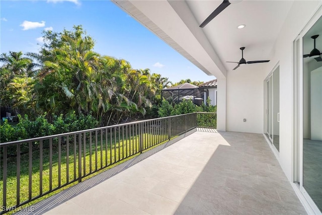 balcony featuring ceiling fan