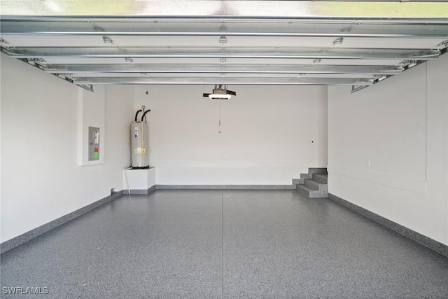 garage featuring electric water heater, electric panel, and a garage door opener