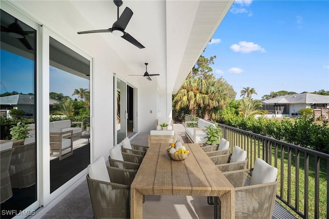 balcony featuring ceiling fan