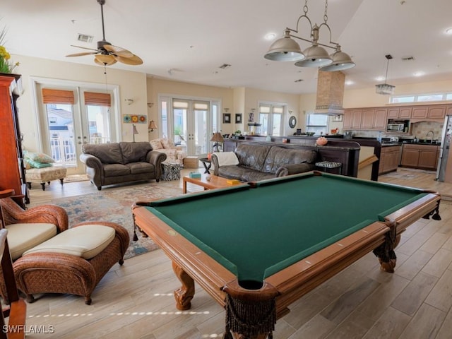 game room featuring ceiling fan, french doors, and billiards