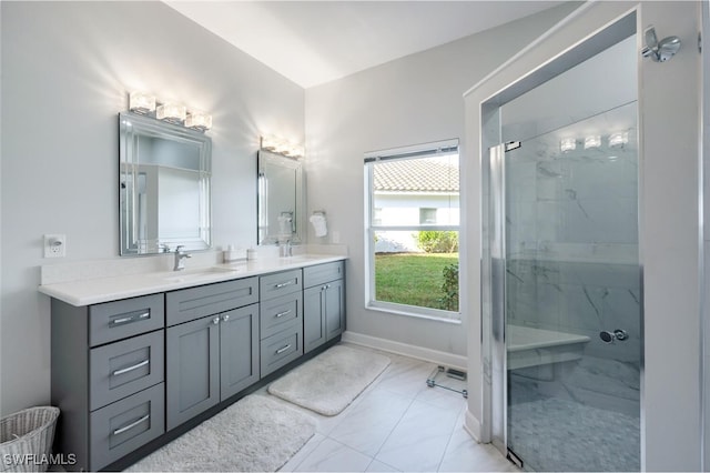 bathroom featuring vanity and walk in shower