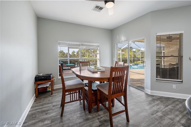 dining area with dark hardwood / wood-style floors, plenty of natural light, and ceiling fan