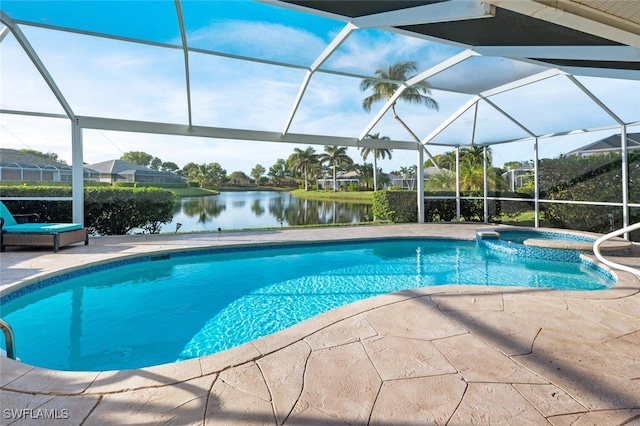 view of swimming pool with glass enclosure, an in ground hot tub, a water view, and a patio