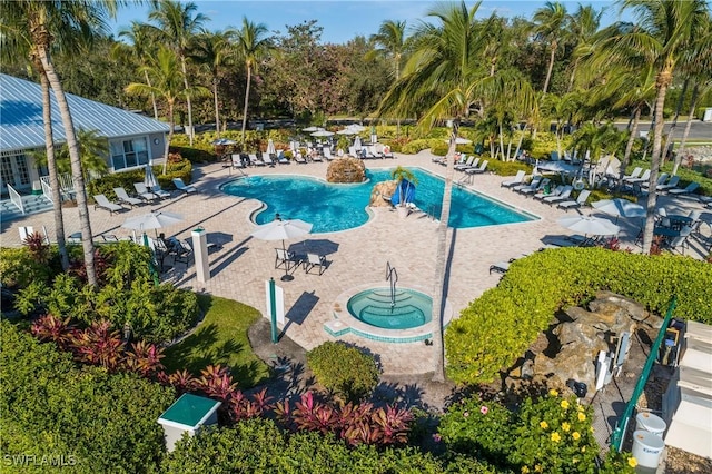 view of swimming pool featuring a patio area