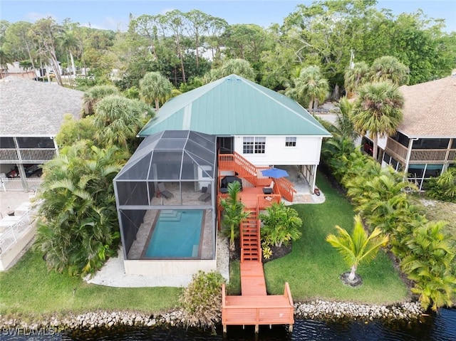 birds eye view of property featuring a water view