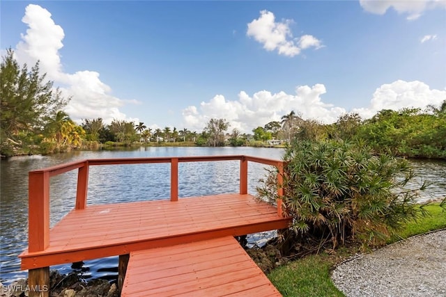 dock area with a deck with water view