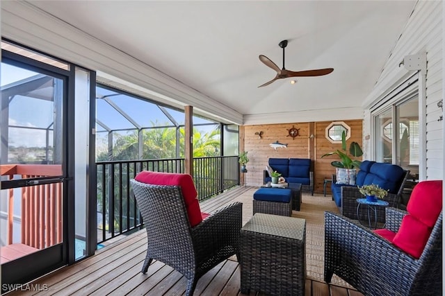 sunroom / solarium with ceiling fan