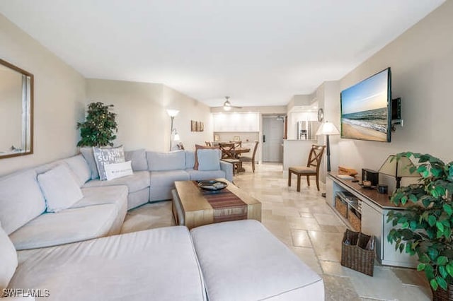 living room with ceiling fan