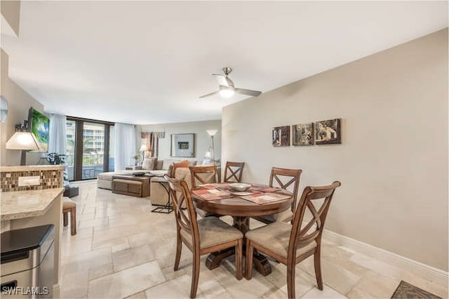 dining area featuring ceiling fan