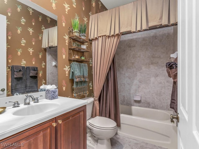 full bathroom featuring shower / tub combo, vanity, and toilet