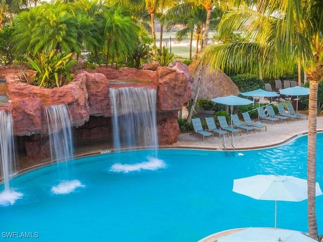 view of pool featuring pool water feature