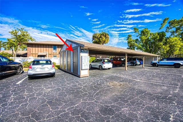 view of car parking featuring a carport