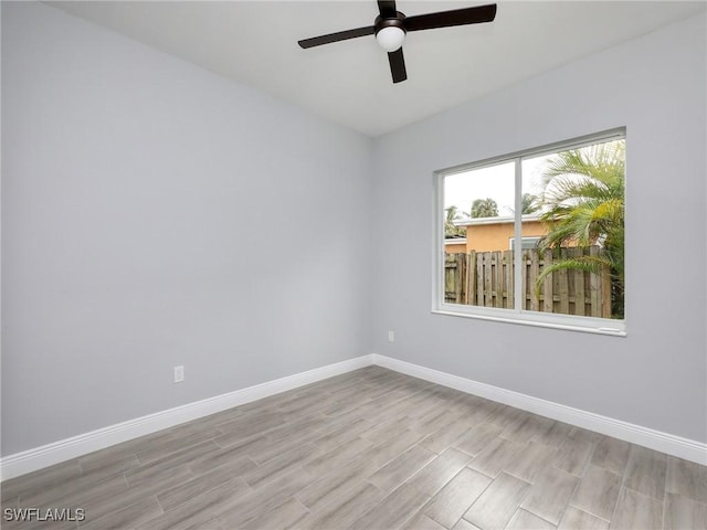 unfurnished room featuring ceiling fan and light hardwood / wood-style flooring