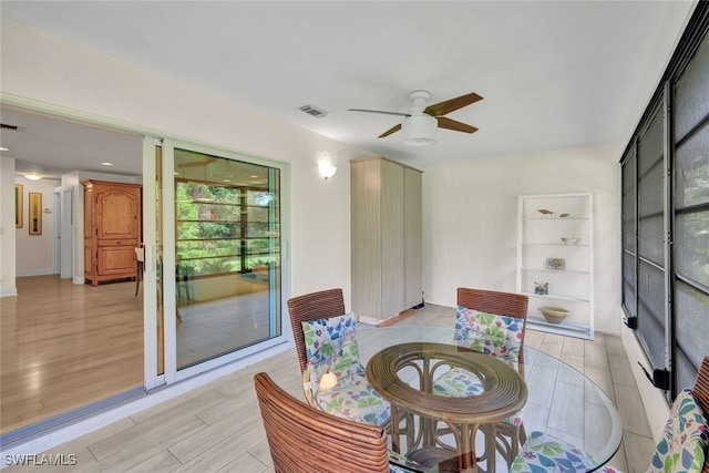 dining room with ceiling fan