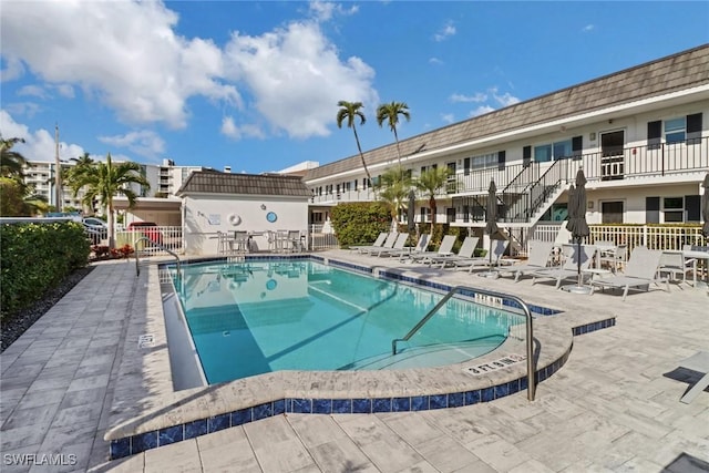 view of pool featuring a patio