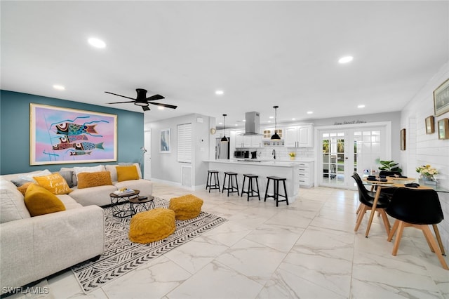 living room with ceiling fan