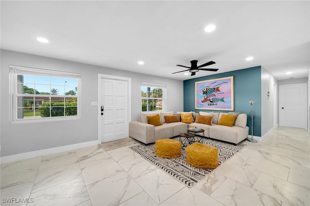 living room featuring ceiling fan