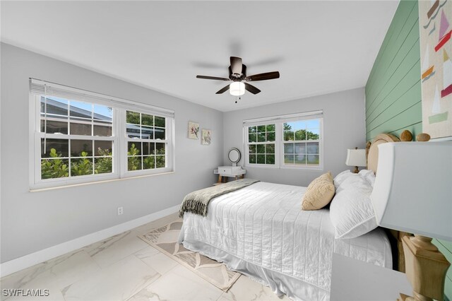 bedroom featuring ceiling fan