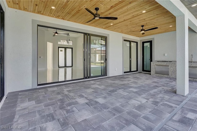 view of patio featuring exterior kitchen