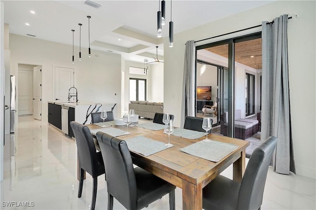 dining area featuring sink