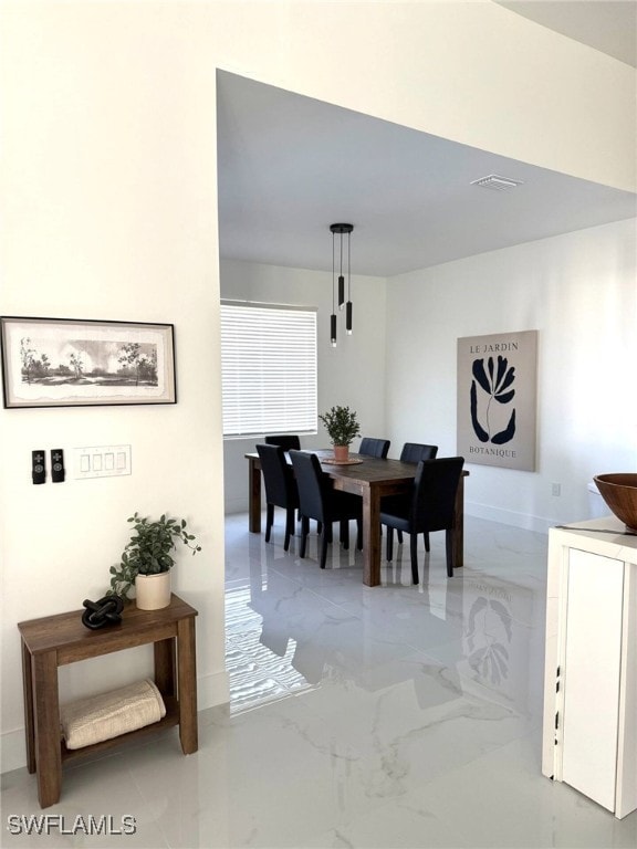 3307 NW 3rd St, Cape Coral, FL 33993 - dining space with marble finish floor, visible vents, and baseboards