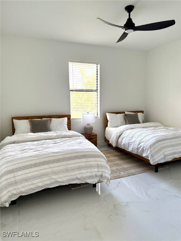 3307 NW 3rd St, Cape Coral, FL 33993 - bedroom featuring ceiling fan and marble finish floor