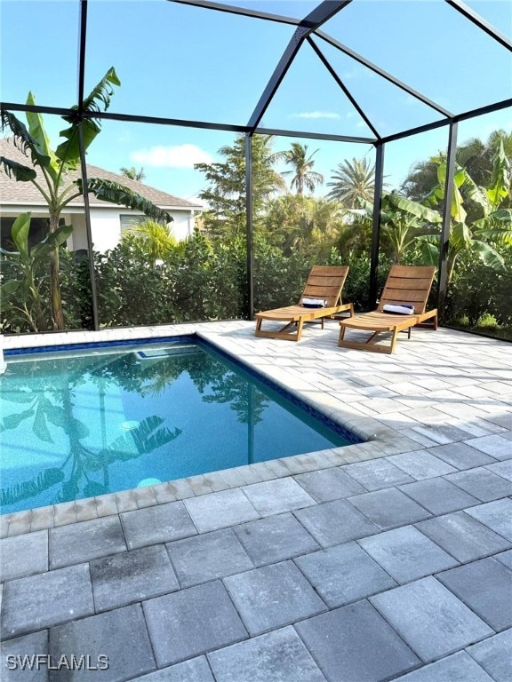 3307 NW 3rd St, Cape Coral, FL 33993 - pool with glass enclosure and a patio