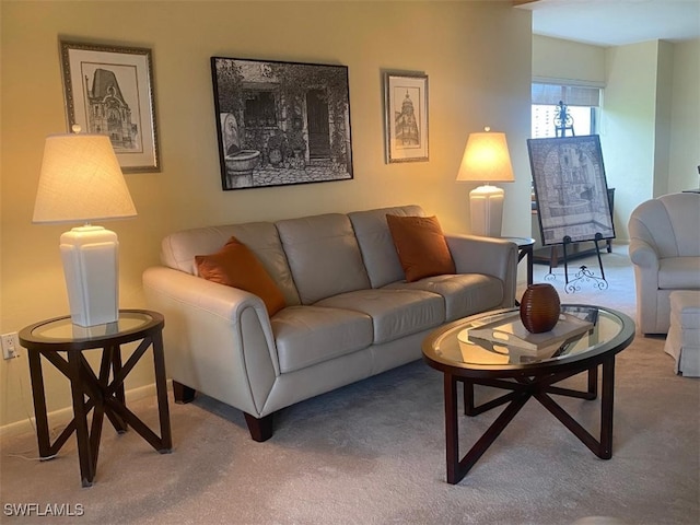 living area featuring light colored carpet