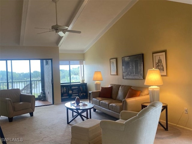 carpeted living room featuring beam ceiling, high vaulted ceiling, and ceiling fan