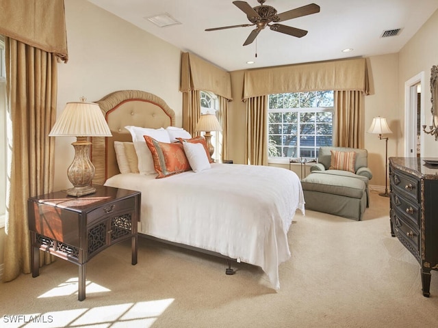 bedroom featuring recessed lighting, visible vents, ceiling fan, and light colored carpet