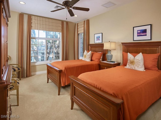 bedroom featuring recessed lighting, visible vents, ceiling fan, and light colored carpet