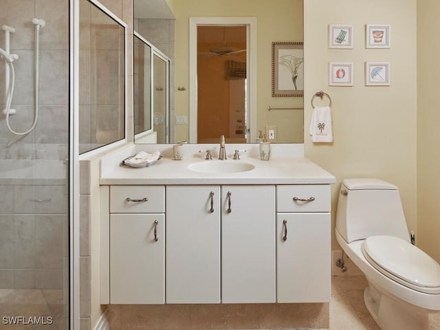 full bath with toilet, a shower stall, and vanity