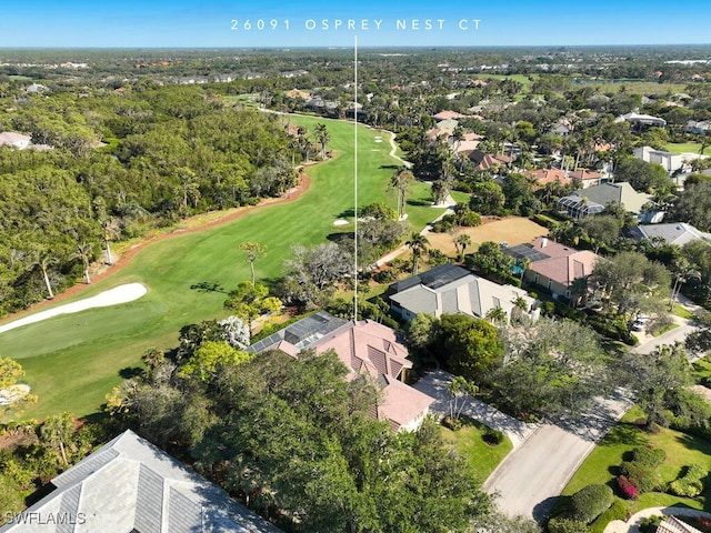 aerial view featuring a residential view and golf course view