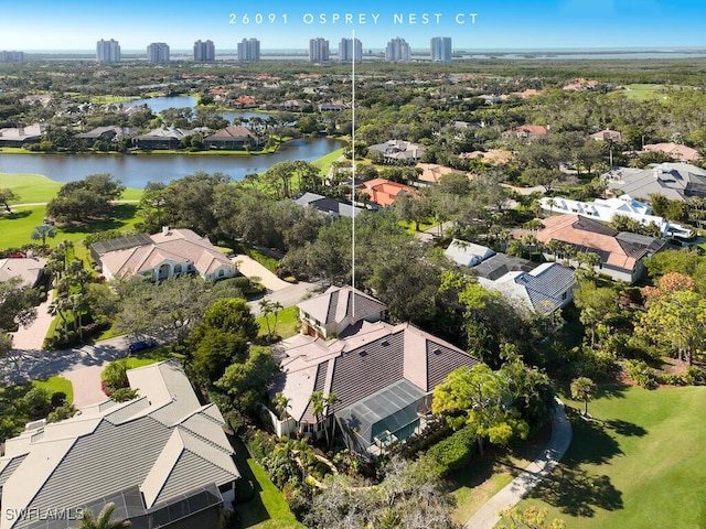 bird's eye view with a water view and a residential view