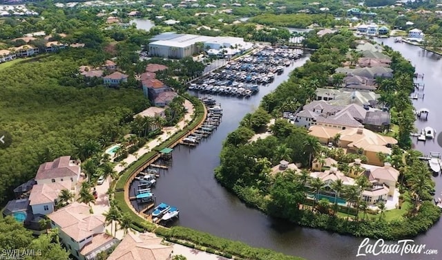 aerial view with a water view and a residential view