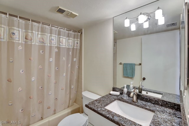 full bathroom featuring a textured ceiling, vanity, shower / tub combo, and toilet