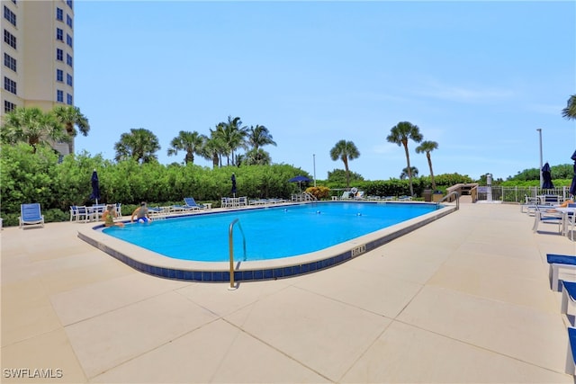 view of pool with a patio area