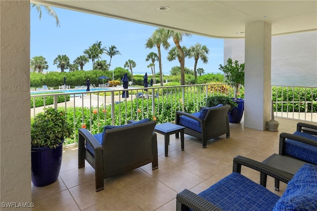 view of patio featuring a balcony