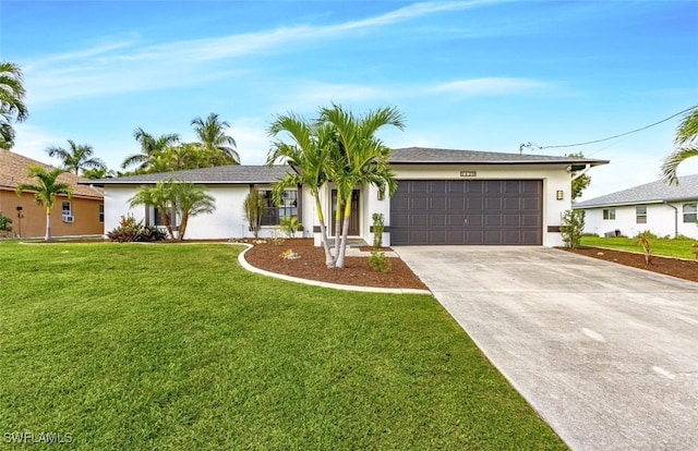 ranch-style home with a garage and a front lawn