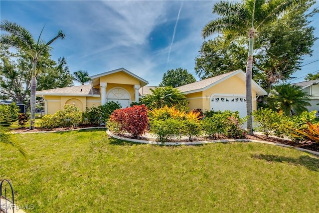 ranch-style home featuring a garage and a front lawn