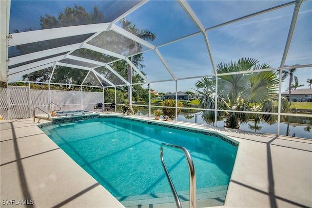 view of swimming pool with a lanai, a patio area, an in ground hot tub, and a water view