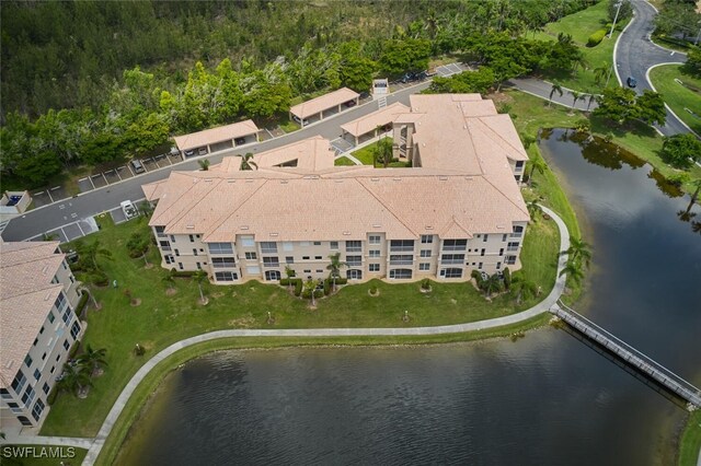 drone / aerial view with a water view