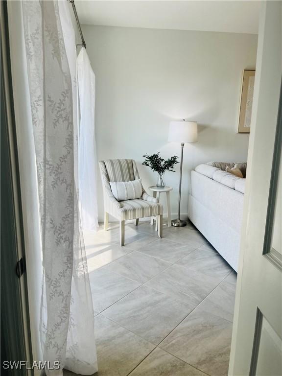 interior space featuring light tile patterned flooring