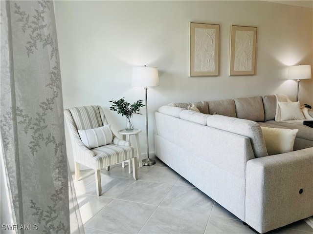 living area with tile patterned flooring