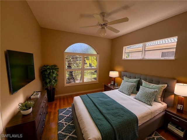 bedroom featuring ceiling fan and dark wood-type flooring