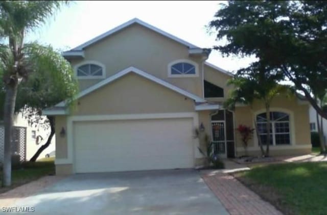 view of property featuring a garage