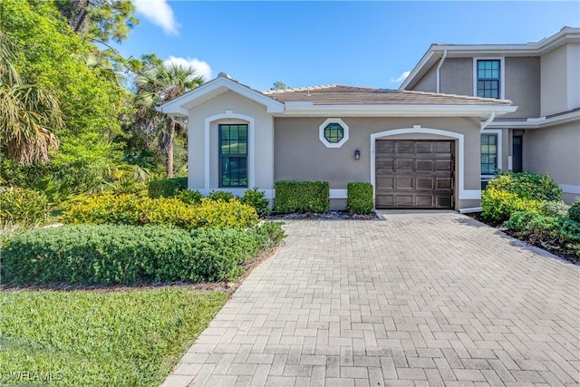 view of front of home with a garage