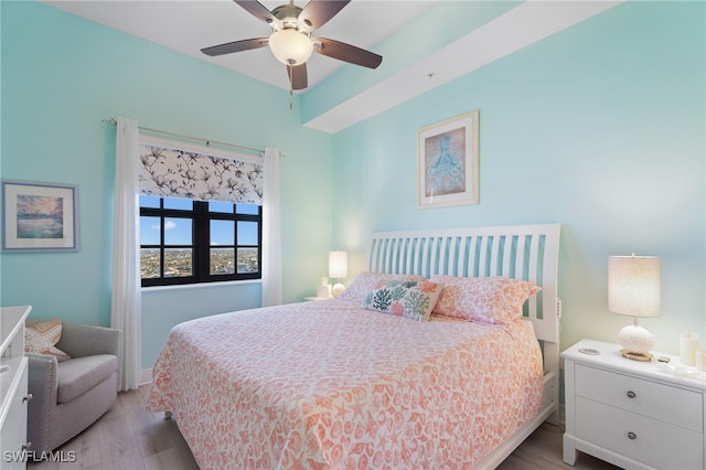 bedroom featuring ceiling fan and light hardwood / wood-style floors